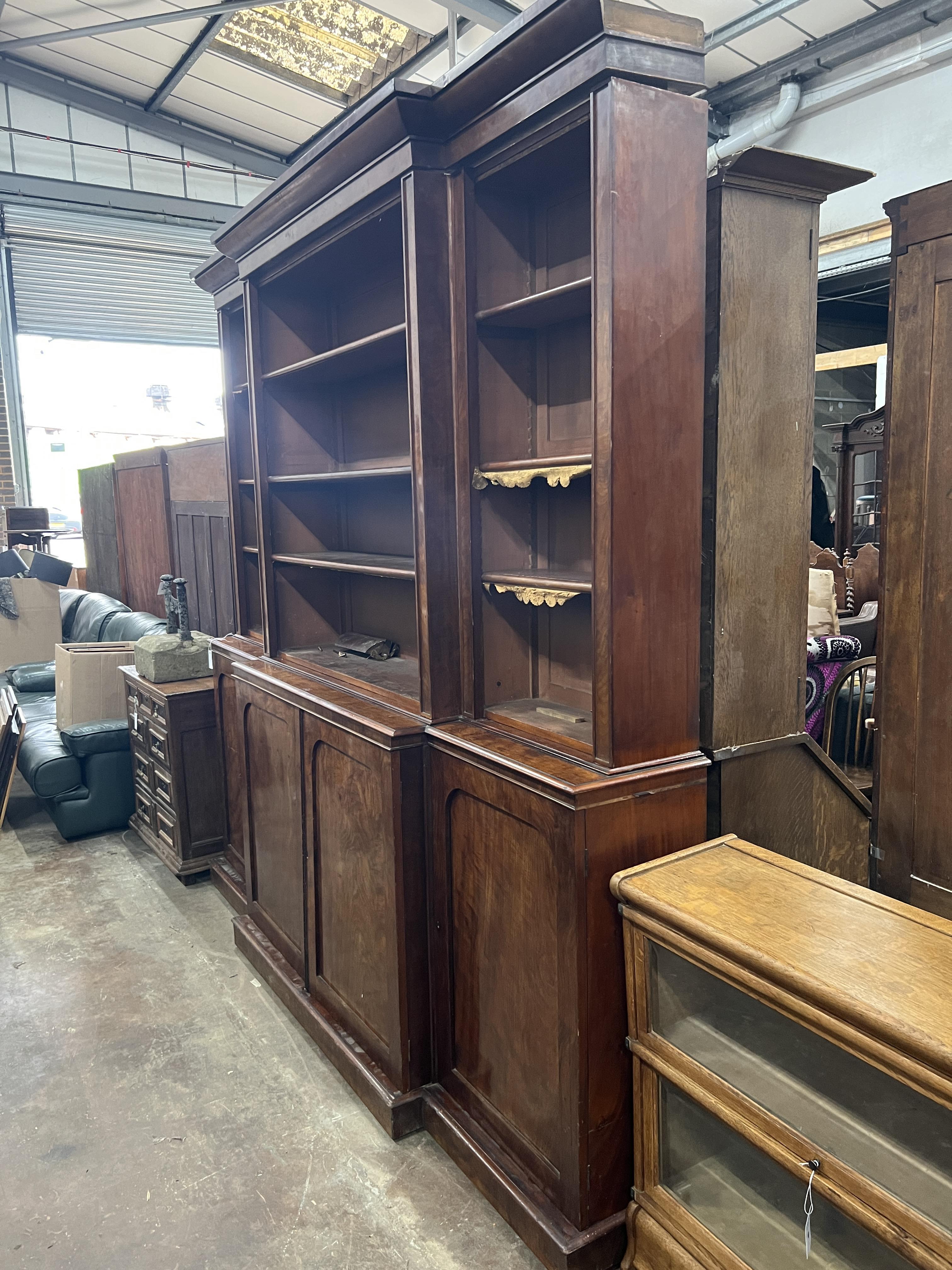 A George IV mahogany breakfront library bookcase, width 236cm, depth 42cm, height 227cm